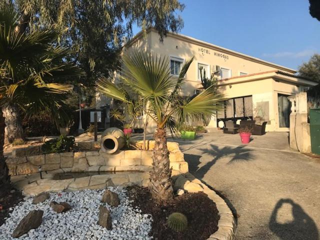 Hôtel Les Mimosas Bormes-les-Mimosas Exterior foto